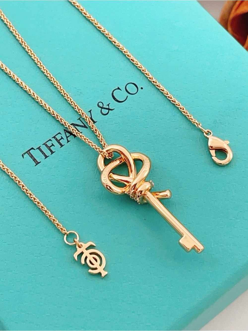 Tiffany & Co. Rose Gold Key Pendant Necklace on Blue Box